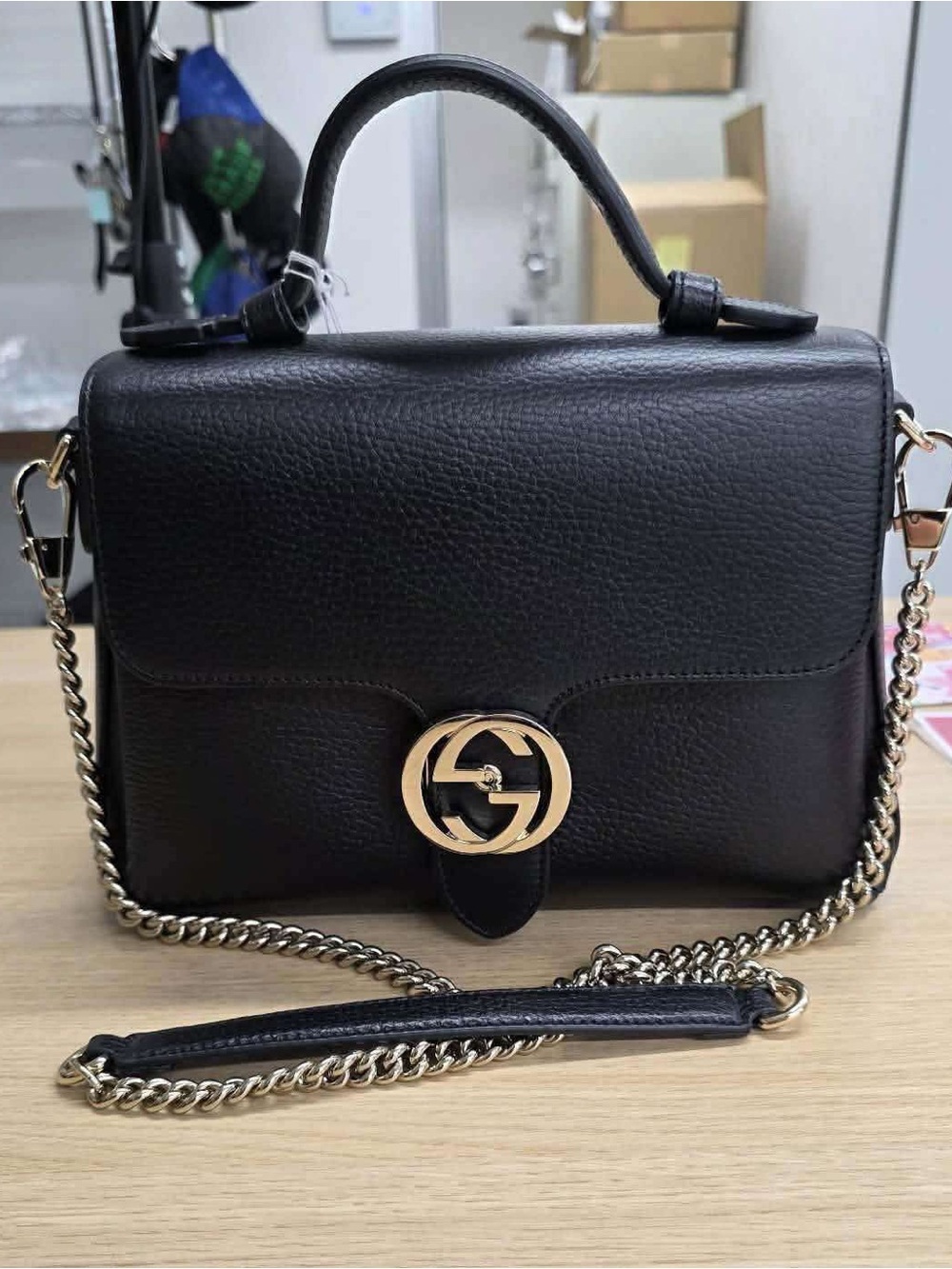 Gucci Black Leather Top-Handle Crossbody with Gold Chain and GG Emblem